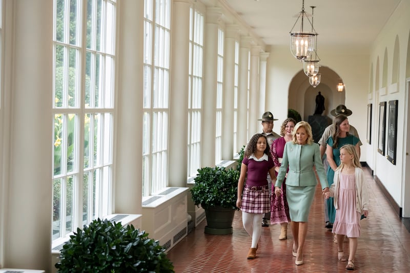 First Lady Jill Biden walks along the East Colonnade to the Military Children’s Corner with military children and their families on Monday, September 25, 2023, at the White House.