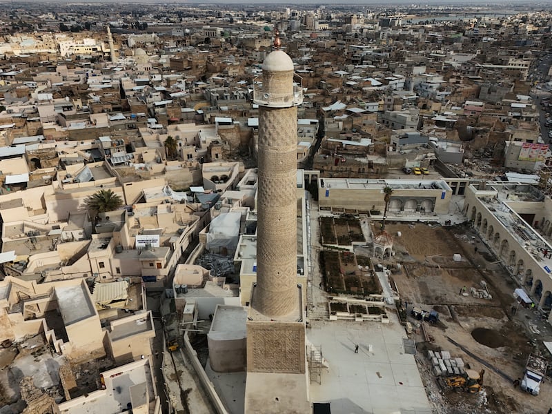 An aerial view of 45-meter-high Al-Hadba Minaret and the historic Grand Nuri Mosque