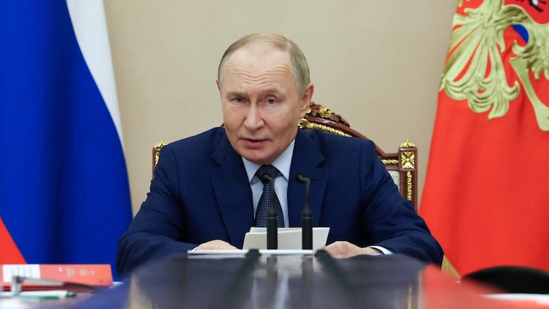 Russian President Vladimir Putin chairs a meeting with members of the Security Council at the Kremlin in Moscow, Russia September 22, 2025.