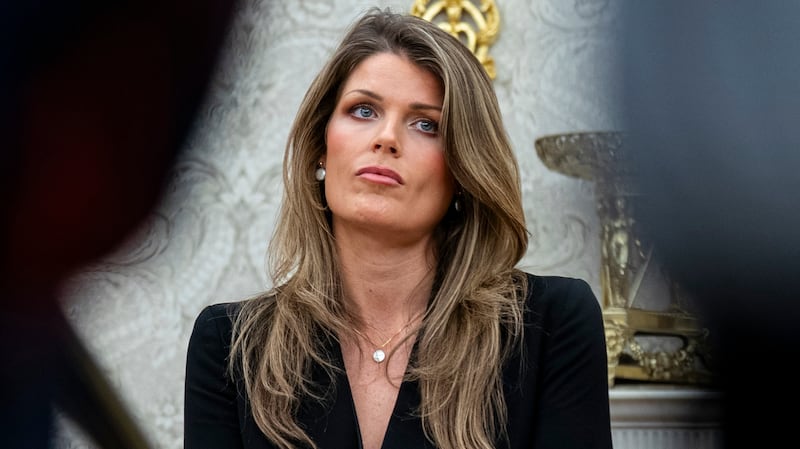 WASHINGTON, DC - MARCH 31: Lindsey Halligan, attorney for U.S. President Donald Trump, looks on during an executive order signing in the Oval Office of the White House, on March 31, 2025 in Washington, DC. (Photo by Al Drago/Getty Images)