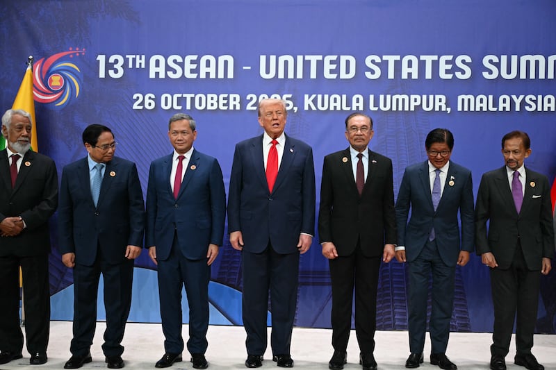 US President Donald Trump (C) poses for a group photo with (from L - R) East Timor's Prime Minister Xanana Gusmao, Vietnam's Prime Minister Pham Minh Chinh, Cambodia's Prime Minister Hun Manet, Malaysia's Prime Minister Anwar Ibrahim, Philippines' President Ferdinand Marcos Jr, and Sultan of Brunei Hassanal Bolkiah, before the 13th ASEAN - United States Summit during the 47th Association of Southeast Asian Nations (ASEAN) Summit in Kuala Lumpur on October 26, 2025. (Photo by ANDREW CABALLERO-REYNOLDS / AFP) (Photo by ANDREW CABALLERO-REYNOLDS/AFP via Getty Images)