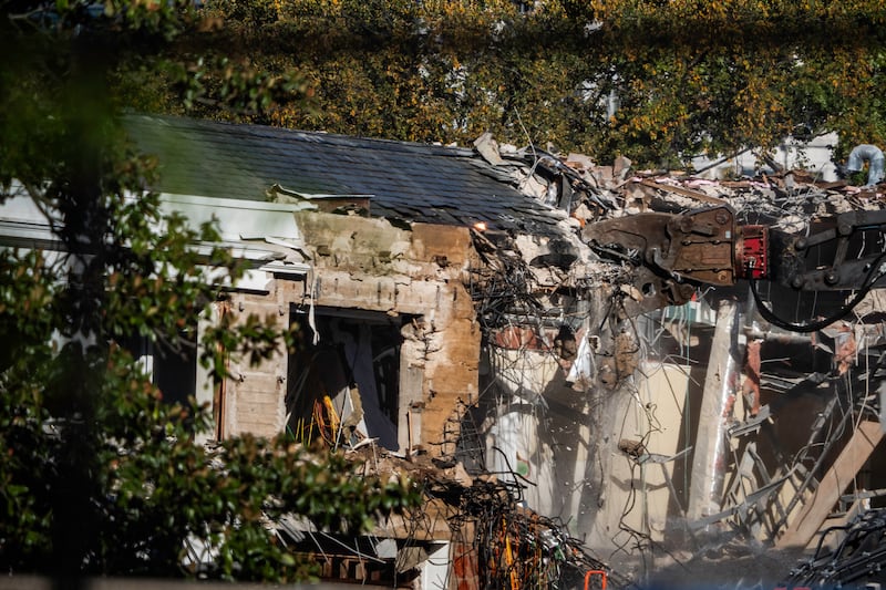 Part of the East Wing of the White House is demolished by work crews during construction to build a new ballroom