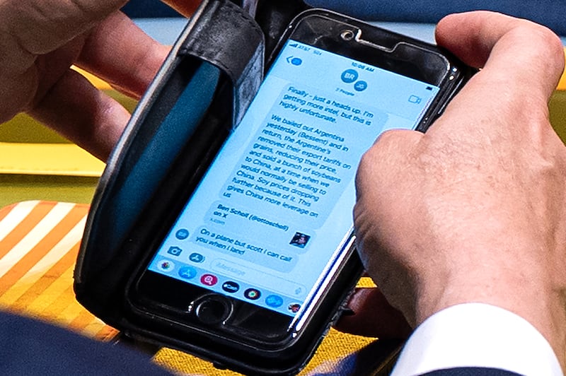 U.S. Treasury Secretary Scott Bessent checks a text message regarding Argentina relations with the U.S. during the 80th session of the United Nations General Assembly at United Nations headquarters, Tuesday, Sept. 23, 2025. (AP Photo/Angelina Katsanis)