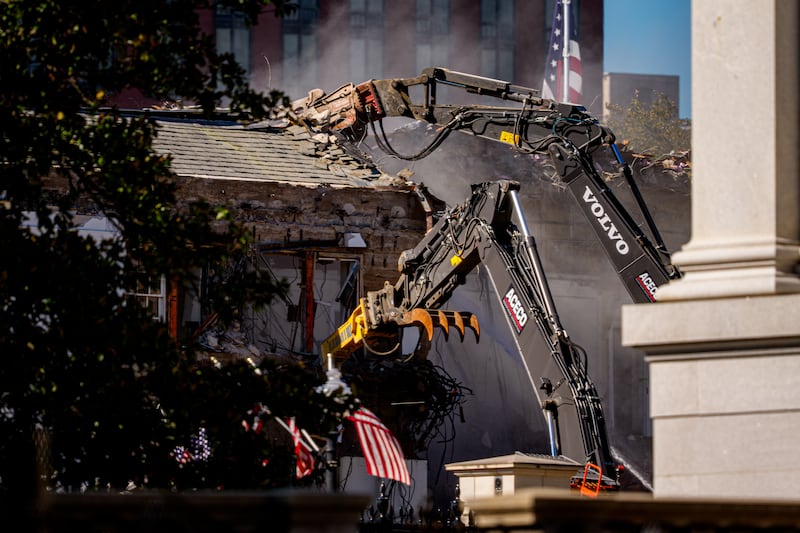 The facade of the East Wing of the White House is demolished by work crews on October 21, 2025 in Washington, DC.