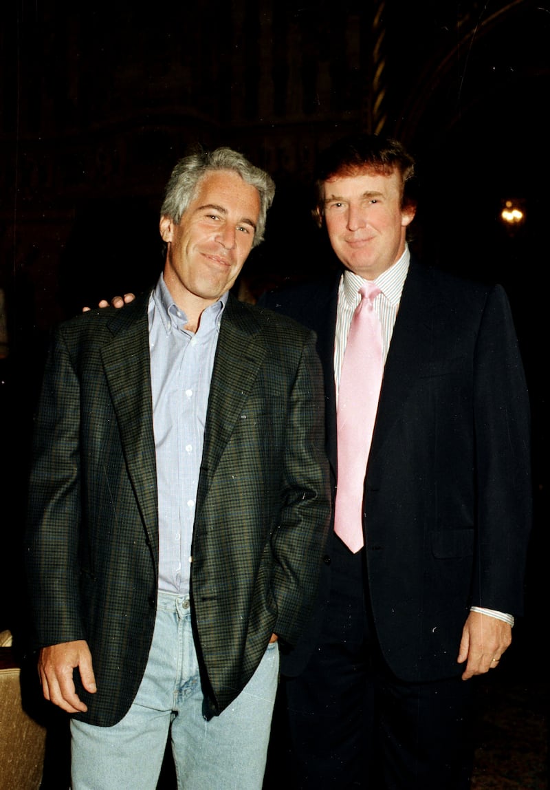 Portrait of American financier Jeffrey Epstein (left) and real estate developer Donald Trump as they pose together at the Mar-a-Lago estate, Palm Beach, Florida, 1997.(Photo by Davidoff Studios/Getty Images)