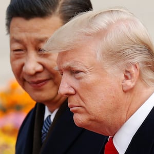 U.S. President Donald Trump takes part in a welcoming ceremony with China's President Xi Jinping in Beijing, China, November 9, 2017. REUTERS/Damir Sagolj