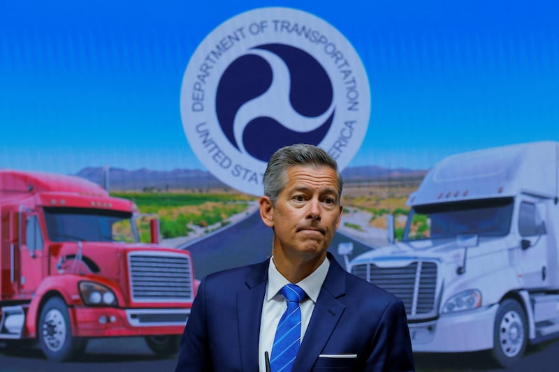 U.S. Transportation Secretary Sean Duffy reacts as he announces actions against states for failing to enforce English language requirements for commercial drivers, during a press conference at the U.S. Department of Transportation in Washington, D.C., U.S., August 26, 2025. REUTERS/Brian Snyder