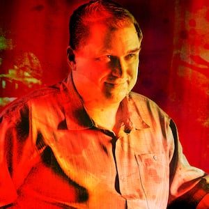 A photo illustration of Michael Chernus as John Wayne Gacy in Devil In Disguise: John Wayne Gacy.