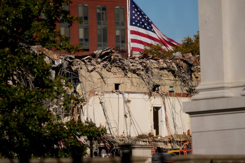 The facade of the East Wing of the White House is demolished by work crews on October 22, 2025 in Washington, DC. The demolition is part of U.S. President Donald Trump's plan to build a ballroom reportedly costing $250 million on the eastern side of the White House.