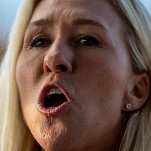 U.S. Rep, Marjorie Taylor Greene (R-GA) attends a campaign rally for Donald Trump.