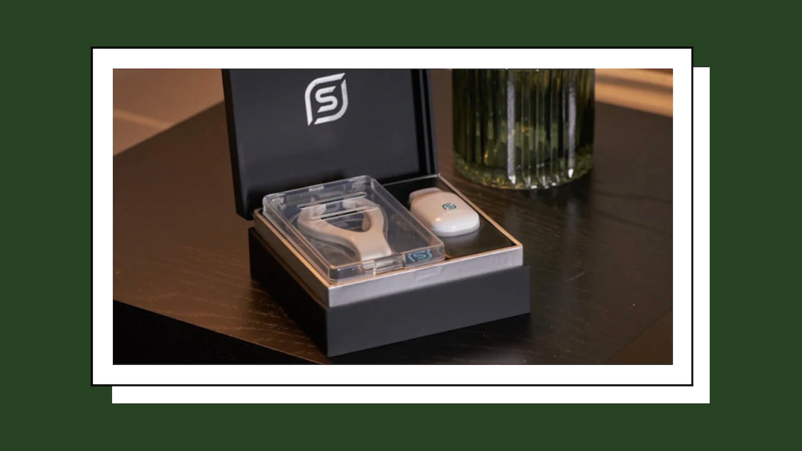 Spring Sleep eXciteOSA Snoring & Sleep Apnea reducer in a black box on a desk.