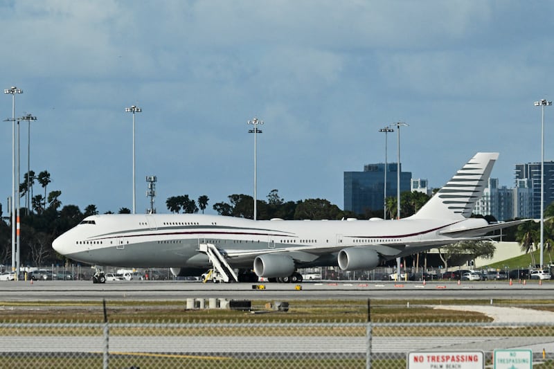 The plane Trump accepted as a gift from Qatar sits on a tarmac.