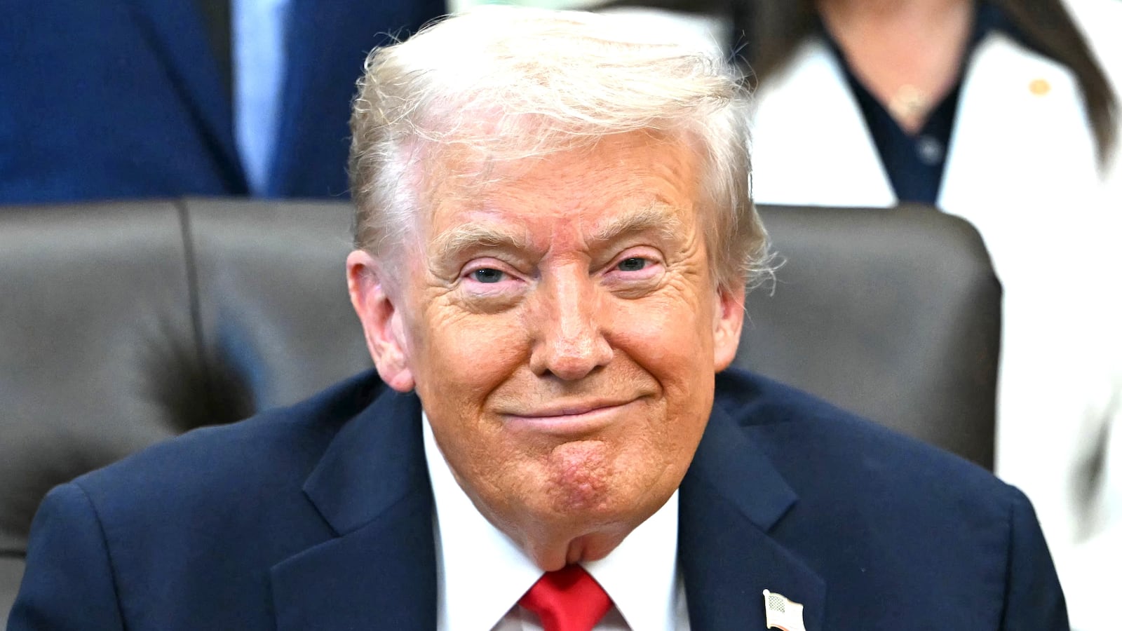 US President Donald Trump smiles during an announcement in the Oval Office of the White House in Washington, DC, on October 16, 2025.