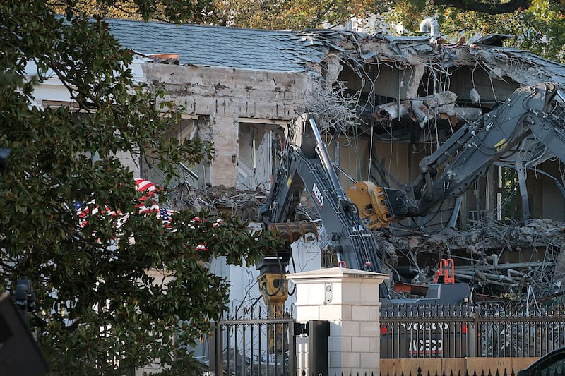 Workers demolish the facade of the East Wing of the White House on October 20, 2025 in Washington, DC. The demolition is part of U.S. President Donald Trump's plan to build a ballroom reportedly costing $250 million on the eastern side of the White House.