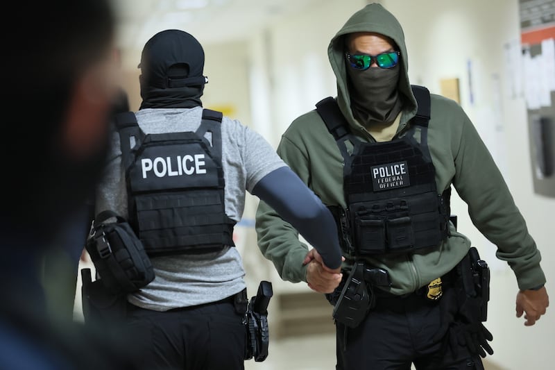 Federal agents patrol the halls of immigration court