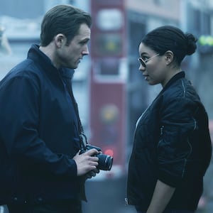 Taron Egerton and Jurnee Smollett in "Smoke."